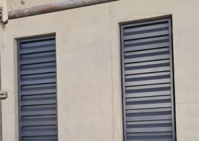 réalisation métallique sur mesure Grilles d'aération résidence atalante réalisées et posées par Ferronnerie Concept